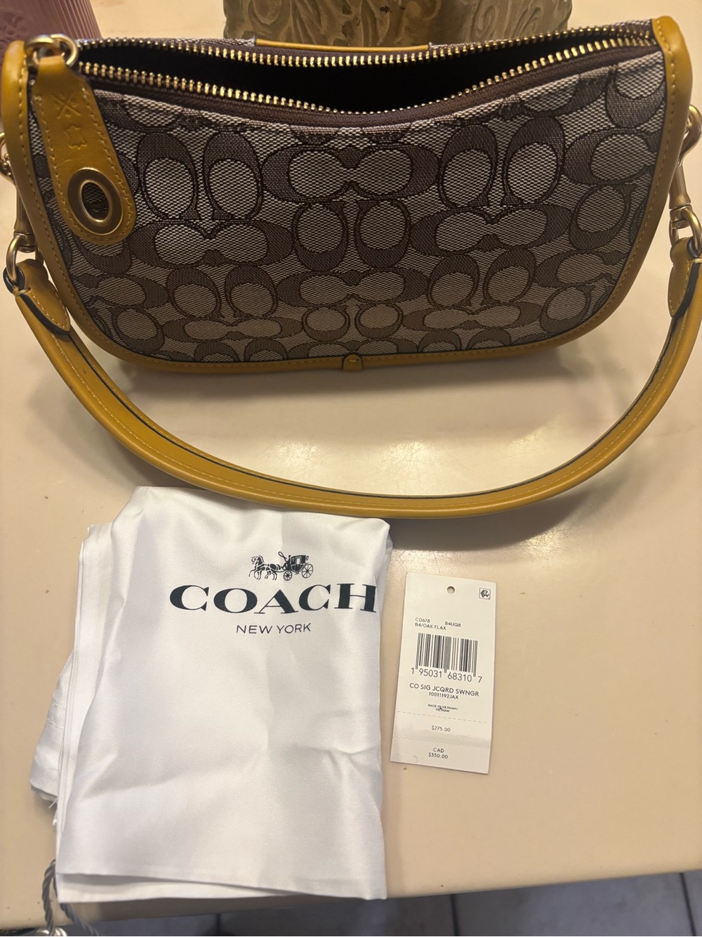 Coach Brown Signature Canvas Shoulder Bag with Yellow Trim